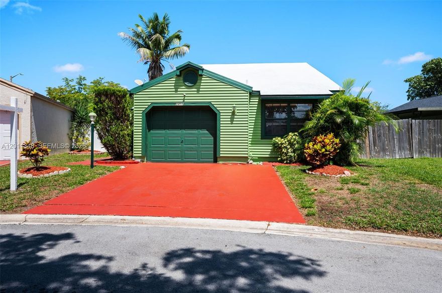 Calling all buyers especially 1st time home buyers ! For the opportunity to finally become a homeowner while building equity along the way by owning this gem in the rough in a great location central to most major interest points in South Florida. This property demonstrates the pride of home ownership due to the vast features and benefits it offers in which most home owners will appreciate and will like to have in a home. For starters this home features a remodeled kitchen with granite counter, a complete set of stainless steel appliances, remodeled bathrooms, new garage door along with remote garage door opener, newer washer and new dryer (with the dryer being a ENERGY STAR certified appliance), porcelain style flooring in main living area and kitchen, A/C unit 5 years old, new re-piped plumbing system throughout the house, extra attic insulation to save $$$ on energy efficiency, freshly painted interior and exterior, the roof has been treated with sun-repelling roof seal, rain gutters throughout, wood laminated in the bedrooms, window treatments, hurricane panel shutters, vaulted ceiling, newer PVC fenced yard with a exterior roofed porch for your leisure and relaxation, sprinkler system. In other word's this home has everything and anything that a homeowner would love to have and enjoy. For housing budgeting purposes this property has a very low monthly HOA of $41.00. All FHA, VA and Conventional loan offers will be considered.