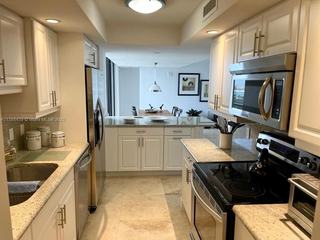 Photo of 3000 N Ocean Dr #20A, Riviera Beach, FL 33404 (MLS # A11388439)