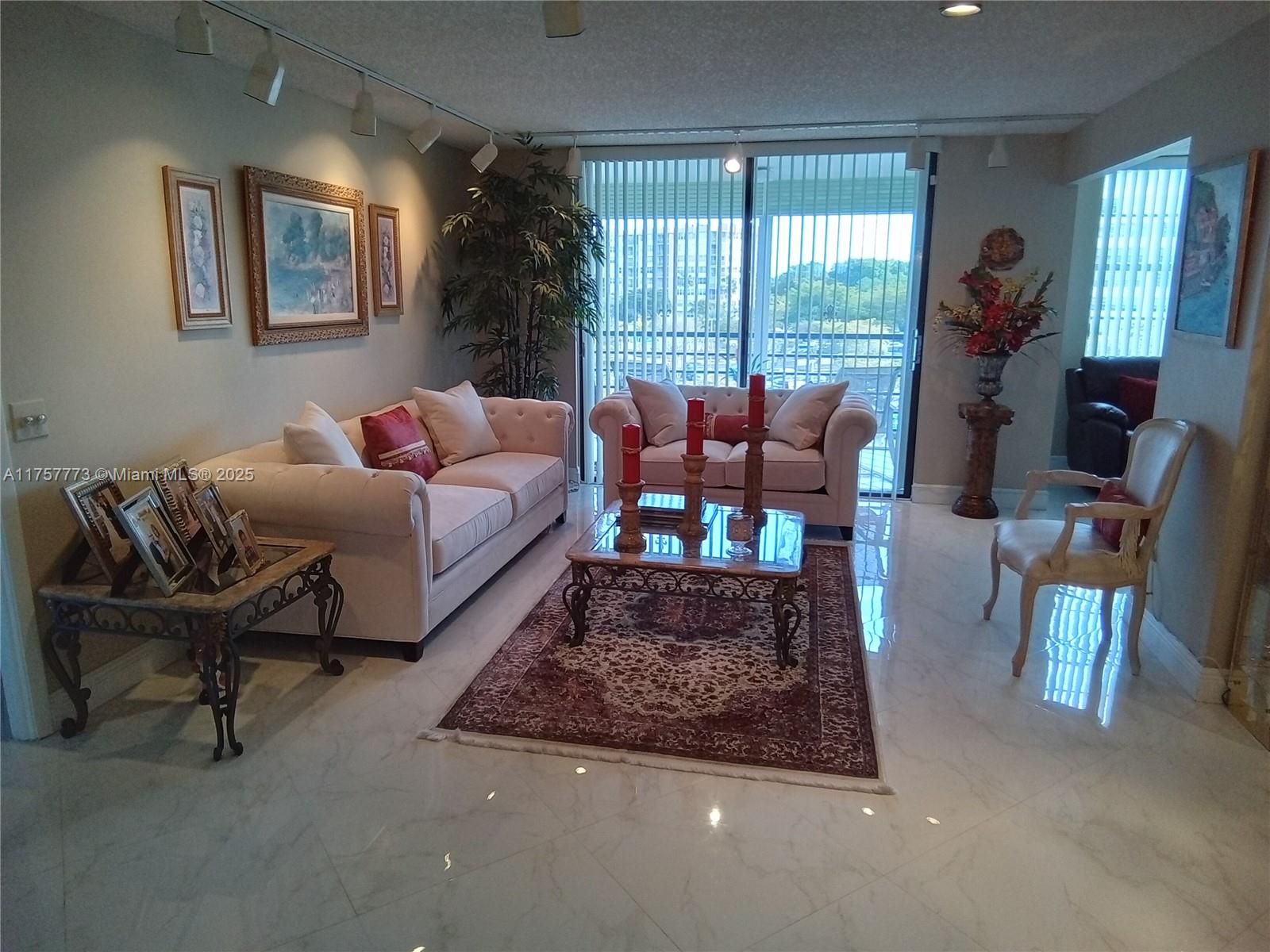 This home is exactly what you're looking for...Beautifully Updated and Meticulously kept...Beautiful tile Porcelain flooring thru out..Stainless Steel Appliances..Quartz counter tops..New AC..Bluetooth music in the Primary bath with awesome colors...Tremendous number of activities and you will enjoy the family life in this Special community. Offering a brand-new park which includes exercise equipment and a picnic area. This is a 55+ community. Correct sq ft is 1,475...No pets or children under the age of 19 yrs old. Association requires 20% down, they have a 20% cap on Rentals and require a 700 credit score. Buildings are on generators so never worry about power outages for the elevators and common areas.