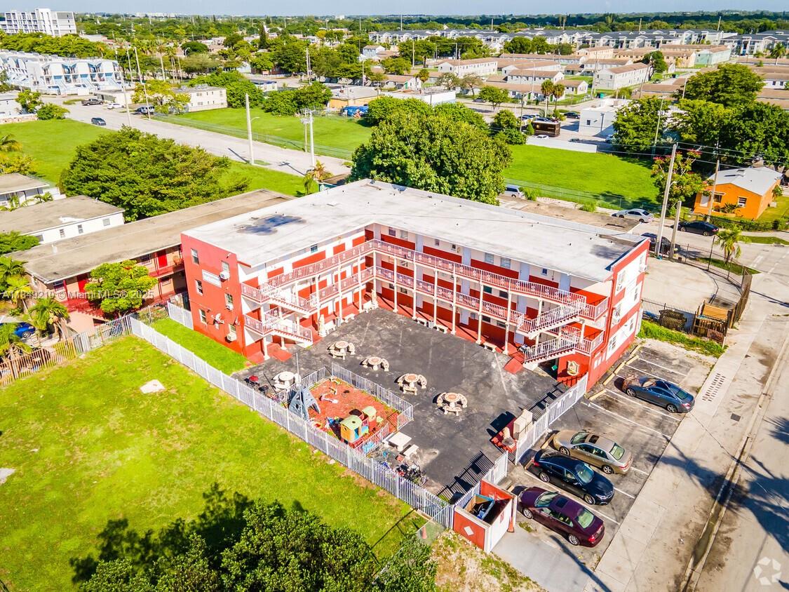 Magnificent 24-unit complex totally remodeled in 2022 spending over $400,000 in a new roof, new kitchens, bathrooms, children playground, laundry mat with new machines, and a gated community. To confirm everything, a 40-year certificate was given by The City of Miami. This building is a money maker, grossing over $40,000 per month and netting over $23,000 per month.