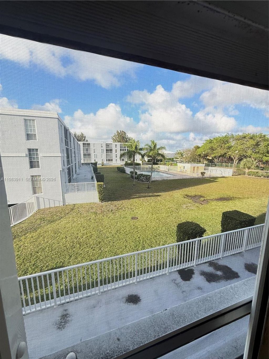 Photo of 7981 S French Dr #2-203, Pembroke Pines, FL 33024 (MLS # A11983911)