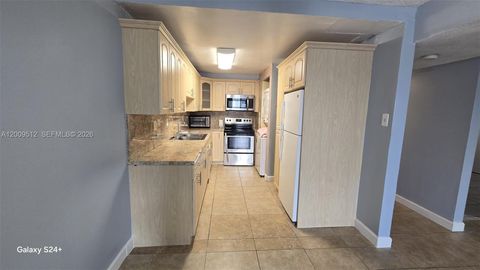 Tiny photo for 10090 NW 80th Ct #1406, Hialeah Gardens, FL 33016 (MLS # A12009512)