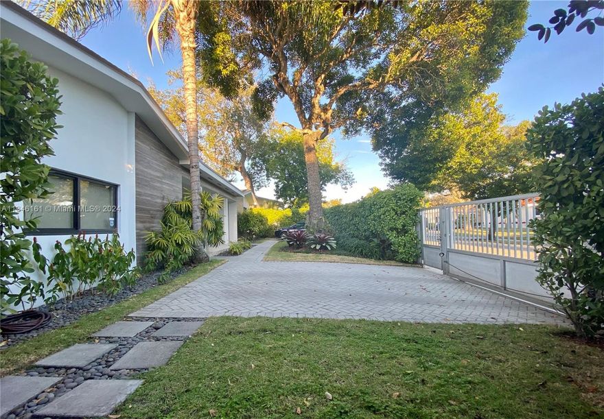 Live at this Gorgeous, Lovely and renovated Mid-Century home 3/3.5 + Great Utility Room in prestigious North Coconut Grove at the exclusive community of Bay Heights. Enter through the gates into a lush tropical garden canopied by mature oaks, perfect floor plan for families. Impact windows, oversize master bedroom with a marble-tiled shower and Jacuzzi tub. Distributed audio system for the foyer, living room, and kitchen. The house also boasts a strong WIFI system. A major renovation was completed in May 2015 which includes the floors, bathrooms, lighting, front of house, landscaping, closets, and much more. 24/7 security patrol Just minutes from Brickell, Downtown, Coral Gables, Key Biscayne and all the great parks, restaurants, cafes, galleries, boutiques and marinas