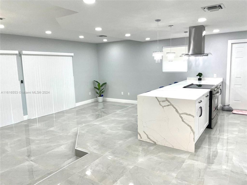 Photo of 1280 W Camino Real, Boca Raton, FL 33486 (MLS # A11616553)