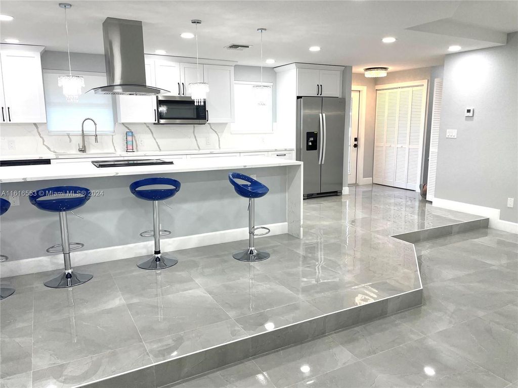 Photo of 1280 W Camino Real, Boca Raton, FL 33486 (MLS # A11616553)