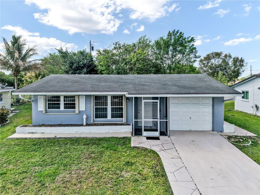 Charming 2-bedroom, 2-bath single-family home located in Mainlands Section 6 of Tamarac, a desirable 55+ community. This residence features a one-car garage, private backyard, and a spacious floor plan offering great potential for customization. Mainlands 6 offers an active lifestyle with amenities including a clubhouse, two community pools (one heated), library, billiards room, arts & crafts building, and beautifully maintained common grounds. Residents also enjoy recreational features such as shuffleboard, bocce ball, and social activities within a well-established community. Conveniently located near shopping, dining, parks, and major roadways, this property presents an excellent opportunity to create your ideal home in a vibrant and centrally located neighborhood.