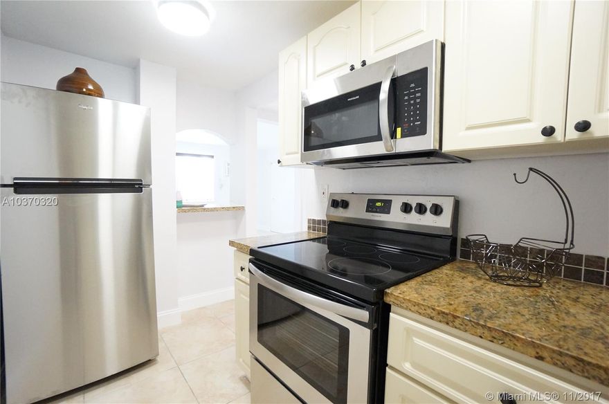 Investor's welcome! Nicest studio in Coral Gate! Forget the rest and bring your pickiest client to see this upgraded 1st floor Studio Apartment with almost 400 sqft of absolute beauty and attention to detail. Freshly painted. Upgraded kitchen with Granite and New SS appliances. Updated bathrooms, tiles throughout with new baseboard. New wall A/C installed. Super low HOA fees and taxes=high ROI! Rent right away for $1,100. 40 yr re-certification Special Assessment paid in full. It will not last!