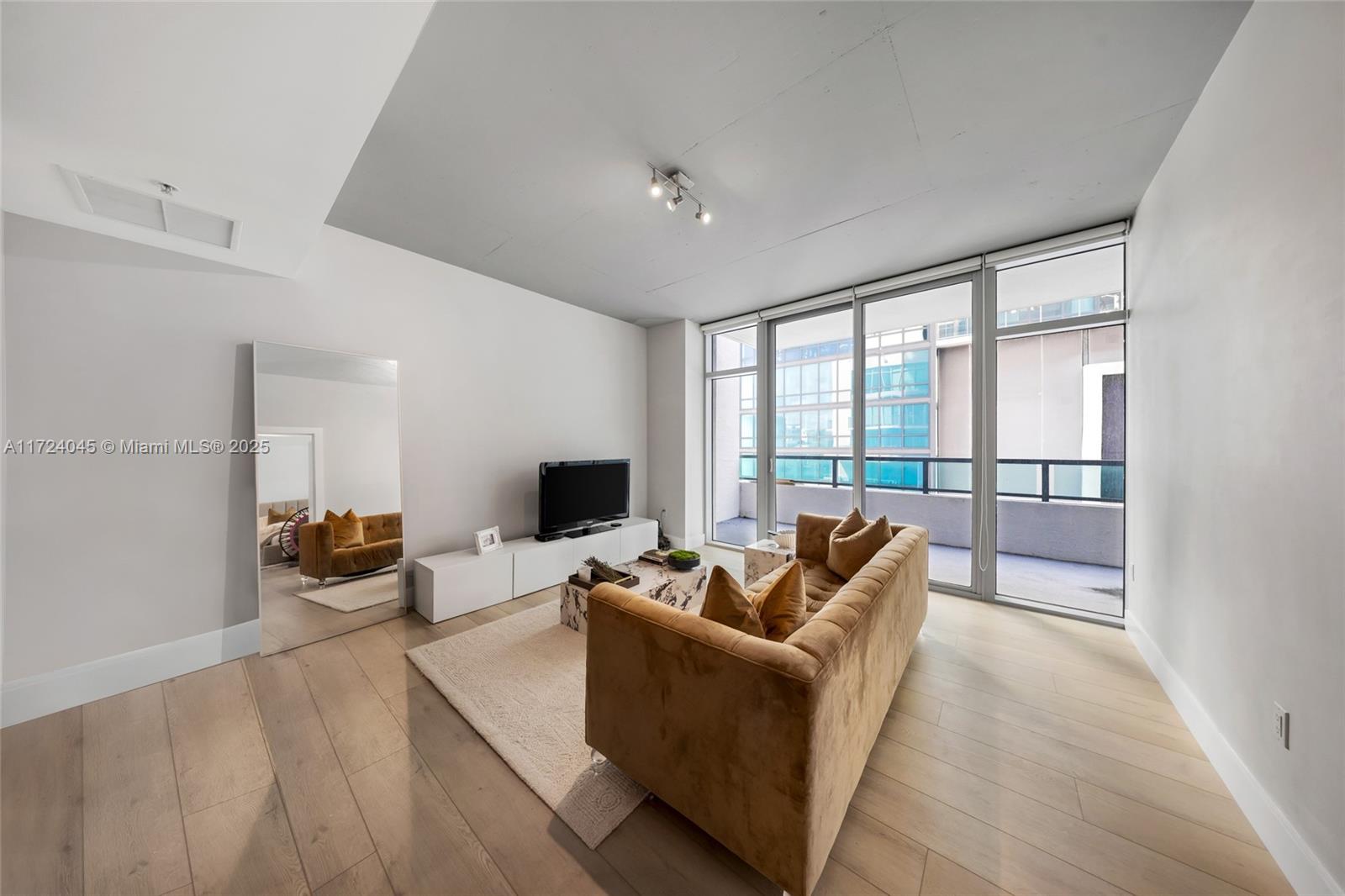 Welcome to Midtown 4 . 1 bed 1.5 bath amazing and bright unit in the heart of Midtown Miami. Prime location just minutes from Miami Design District, Downtown and Brickell. Walking distance to restaurants, shopping, park and nightlife. Unit has been tastefully upgraded with Brand-new floors throughout , Updated modern bathroom , New AC, fridge, washer, and dryer , Floor-to-ceiling windows. Custom closets. Amenities include a lap pool, jacuzzi, BBQ area, gym, yoga room, and sauna. Don’t miss this stylish urban retreat. Don't miss this opportunity!