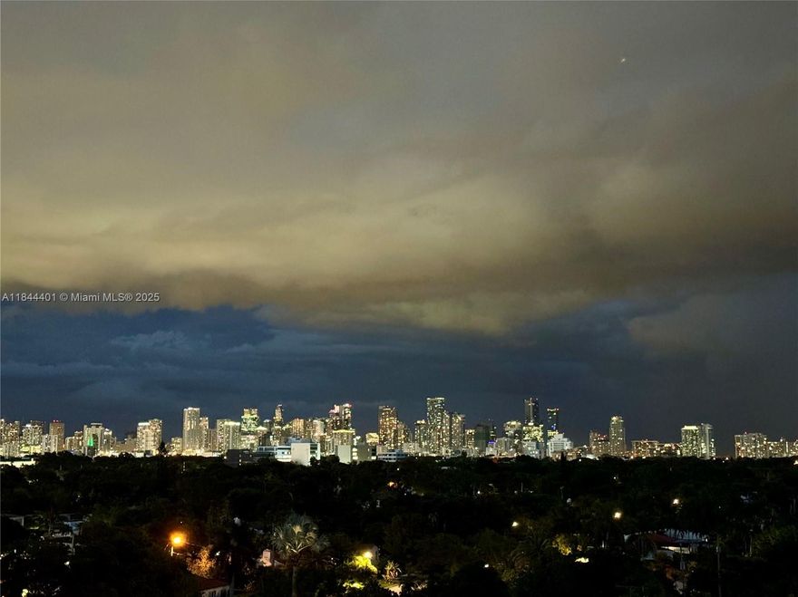 SPECIAL FINANCING INCENTIVE: QUALIFIED BUYERS MAY RECEIVE UP TO 2% LENDER CREDIT TOWARD CLOSING COSTS OR RATE REDUCTION, contact listing agent - Largest 2-Bed/2-Bath in the area (1,296 SF) corner unit with den/office & 2 assigned parking spaces. Rare east-facing exposure offers skyline views, quiet living, & bright natural light. Spacious split floor plan with balcony access from bedrooms, kitchen, & living room. Modern kitchen, stainless steel appliances, washer/dryer in unit. Enjoy pool, gym, rec room, & secure entry in this boutique building. Prime location near Coral Gables, Coconut Grove, Downtown & major transit. Includes a transferable home warranty covering HVAC, plumbing, electrical for added peace of mind. Exceptional value for size and location.