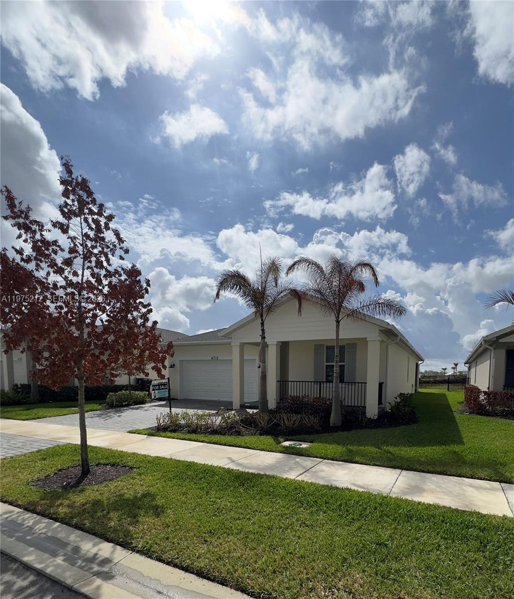 Photo of 6712 NW Cloverdale Ave, Port St Lucie, FL 34987 (MLS # A11975212)