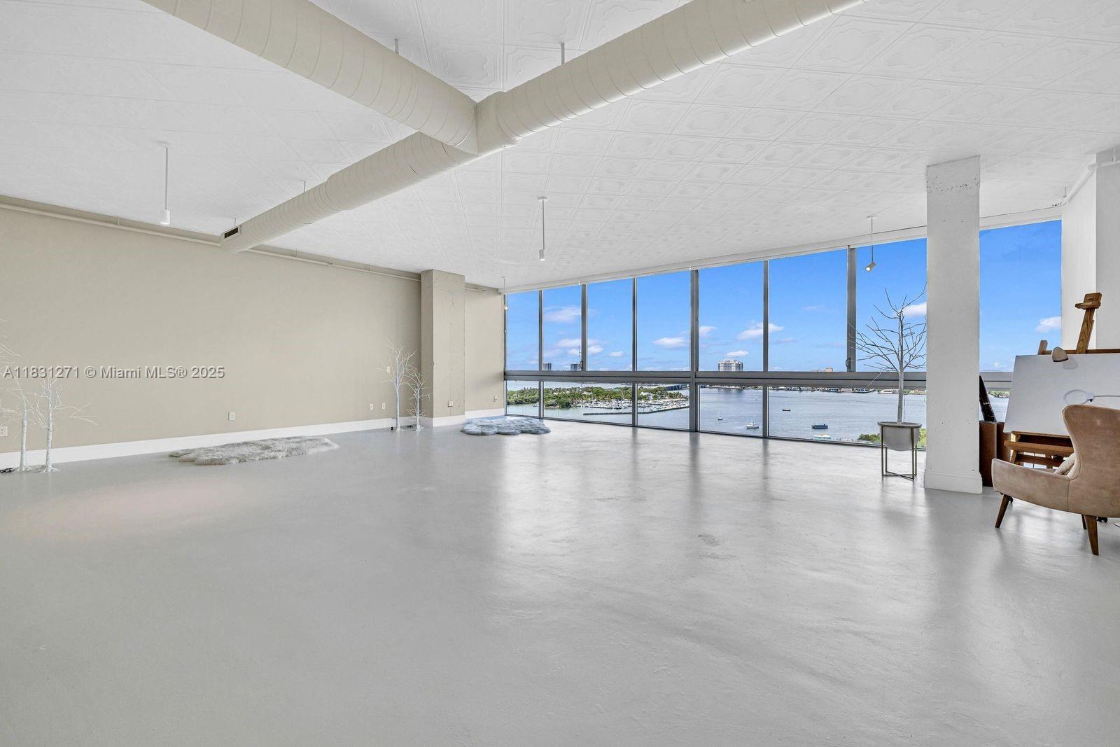 Loft-Style Luxury in the Sky! Soaring 12 ft ceilings, dramatic floor-to-ceiling windows, and unmatched Bayfront views—this is elevated living at its finest. Enjoy resort-style amenities like a state-of-the-art gym, and a stunning rooftop pool in the heart of North Bay Village, just minutes away from Miami's most beautiful beaches, with close proximity to Bal Harbour, Miami Beach - and surrounded by the best restaurants and night life Miami has to offer.
Want more space? The owner is also open to combining the adjacent unit, creating a 3,696 sq ft open-concept mansion in the sky—yours for $12,000/mo.