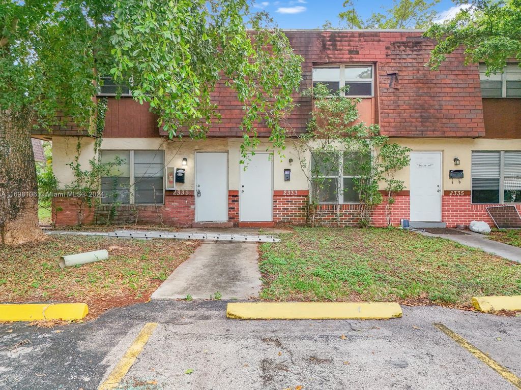 Photo of 2333 NW 59th Way #2333, Lauderhill, FL 33313 (MLS # A11698106)