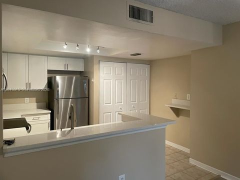 Photo of 4195 N Haverhill Rd #318, West Palm Beach, FL 33417 (MLS # A12013315)