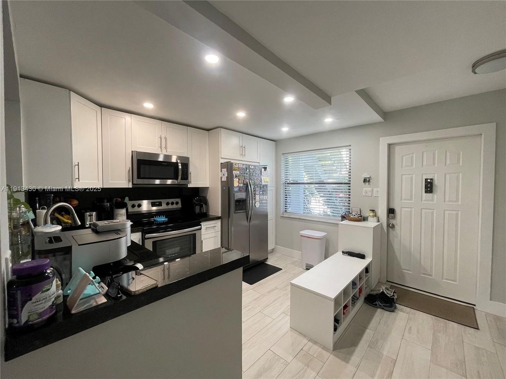 Photo of 1290 S Military Trl #411, Deerfield Beach, FL 33442 (MLS # A11913430)