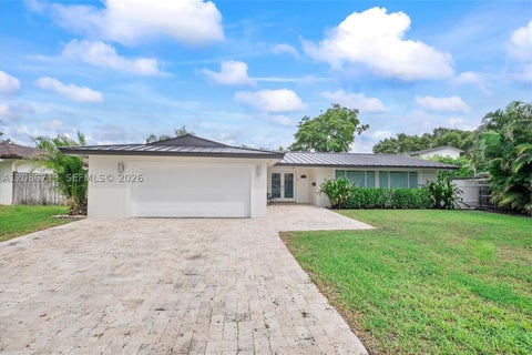 Photo of 7111 Bamboo St, Miami Lakes, FL 33014 (MLS # A12086713)