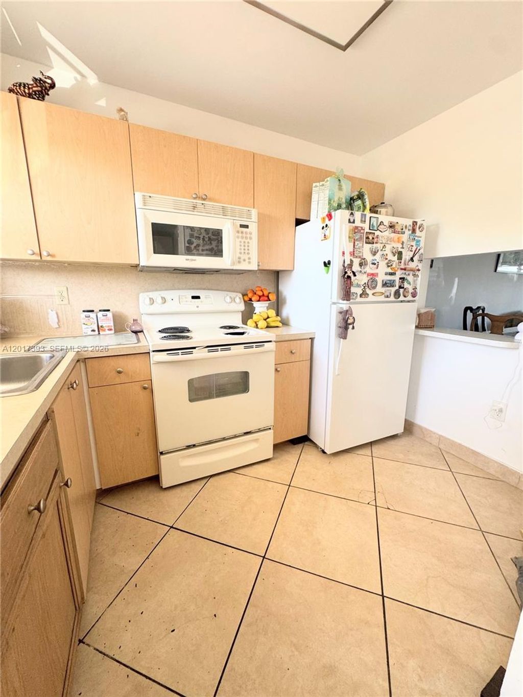 Photo of 8130 Sunrise Lakes Blvd #202, Sunrise, FL 33322 (MLS # A12017393)