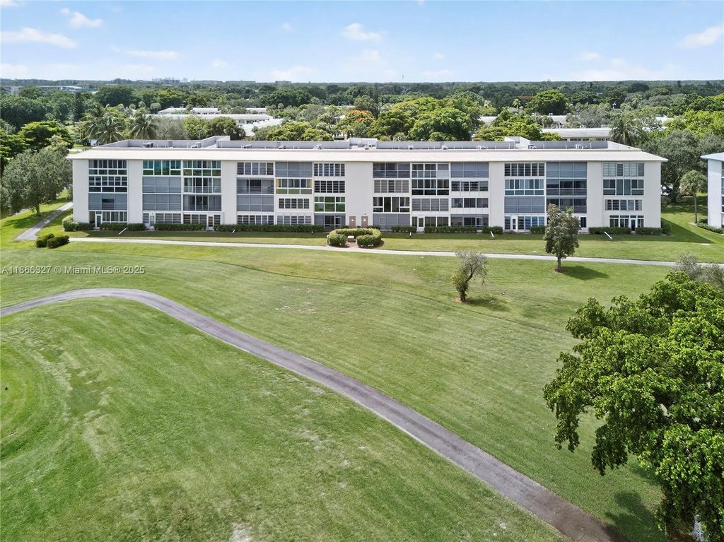 Photo of 2801 Victoria Way #G1, Coconut Creek, FL 33066 (MLS # A11866327)