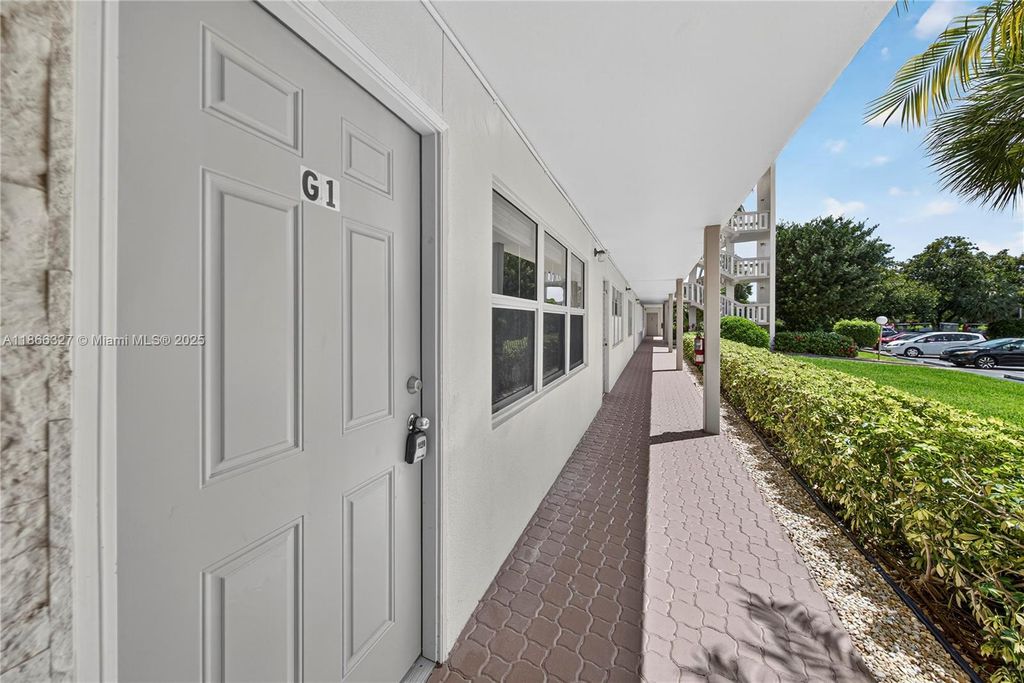 Photo of 2801 Victoria Way #G1, Coconut Creek, FL 33066 (MLS # A11866327)