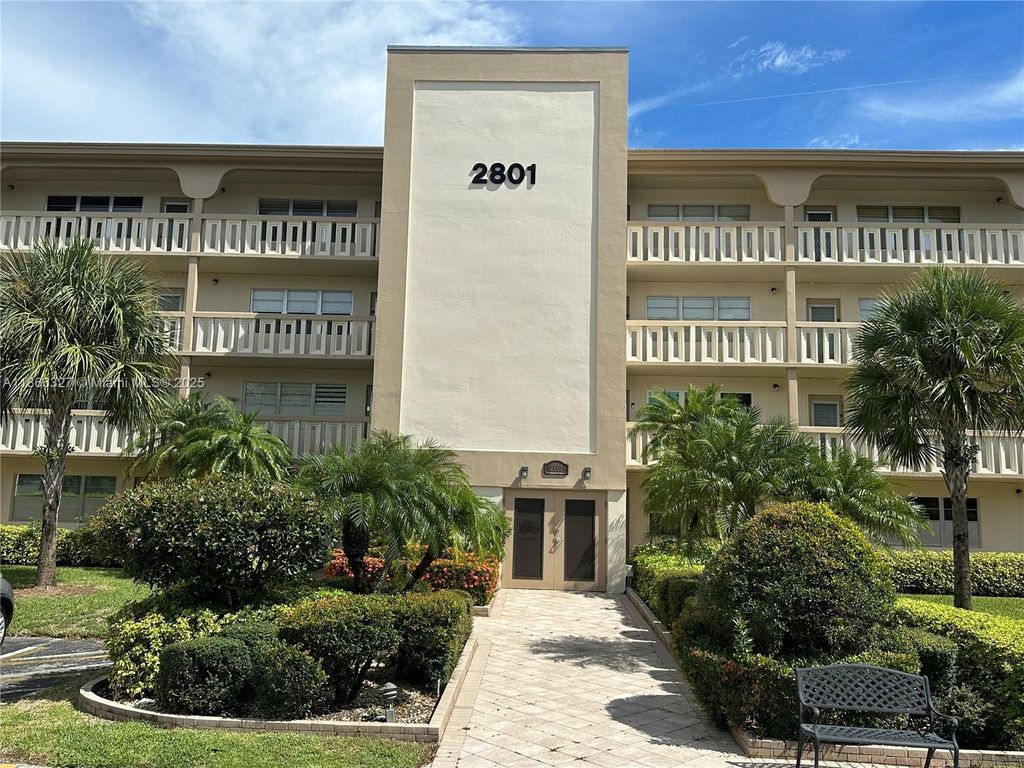 Photo of 2801 Victoria Way #G1, Coconut Creek, FL 33066 (MLS # A11866327)