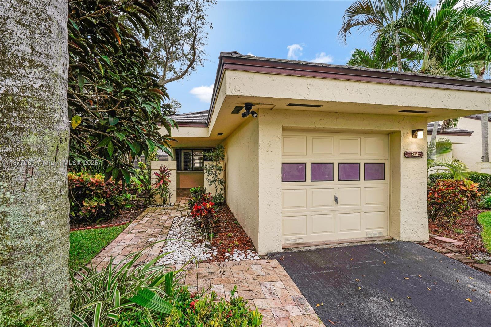 Prestigious Central Park @ Jacaranda. This stunning 1-story villa boasts 3 bedrooms, 2 bathrooms + 1-car garage. The community offers winding roads & serene waterways, creating a park-like ambiance. This corner Carlyle model features a kitchen with breakfast nook, abundant cabinet, countertop space and food pantry. The living room's vaulted ceilings enhance the spacious feel, while all bedrooms are generously sized. Both bathrooms have been updated, the master bath showcasing a beautifully tiled shower with a glass enclosure. The AC unit was replaced in 2021, the roof in 2019 & the entire plumbing system upgraded in 2024. Max 2 pets allowed below 30 LBS/each. Additional features include accordion hurricane shutters and access to a large community pool with a spa in an exceptional location.