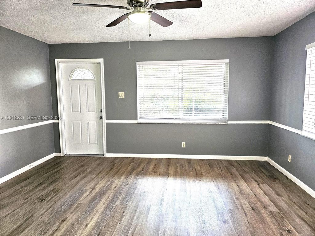 Photo of 1040 NW 73rd Ter, Margate, FL 33063 (MLS # A12012281)