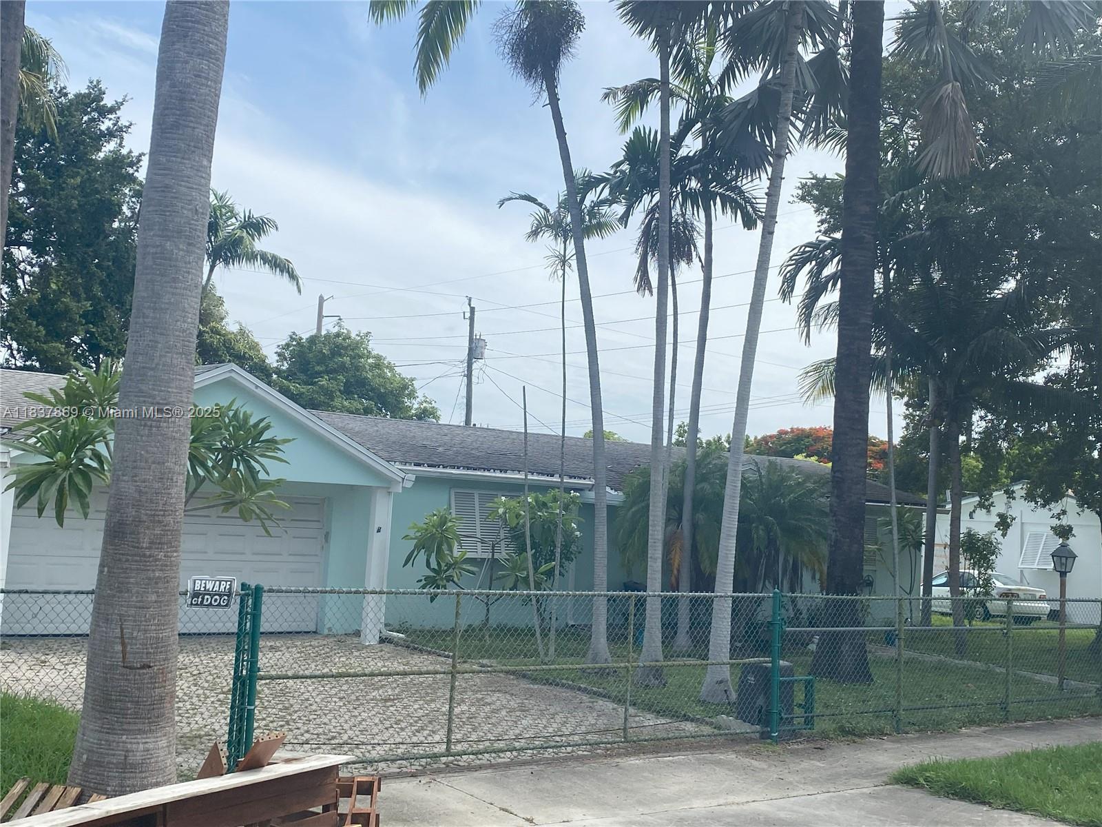 First Time on the Market for Rent! Welcome to this oversized 3-bedroom, 2-bathroom home featuring a spacious living area, two-car garage, storage shed, and plenty of room for your boat. Enjoy outdoor living with a large covered patio and fenced yard, perfect for gatherings. The kitchen is a chef’s delight—nicely appointed with solid wood cabinets, Corian countertops, double oven, sub-zero refrigerator, and gas range. Home also offers gas water heater and dryer, plus storm shutters for peace of mind. Centrally located near dining, shopping malls, and major highways—combining comfort, style, and convenience. Don’t miss this opportunity! Call listing agent today for a private showing.