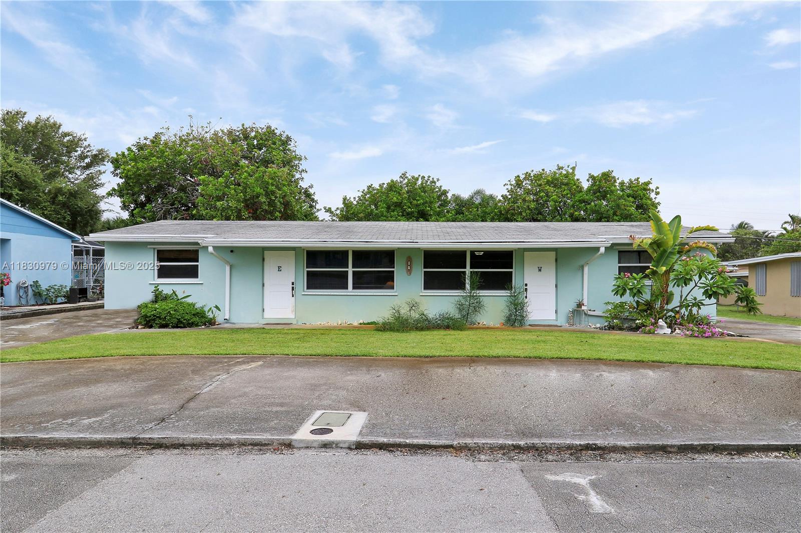 Welcome to 1884 Juno Road, a well-maintained duplex nestled in the highly desirable North Palm Beach. This solid concrete block duplex features two spacious units, each offering 2 bedrooms and 1 full bathroom, with their own private driveway, entrance, kitchen, laundry and outdoor storage area. Each side also has a spacious, fenced in back yard, ideal for owner-occupants, investors, or short/long-term rental strategies.
Each side boasts a functional floor plan with bright living areas, ample kitchen space and is the perfect layout for comfortable living or maximizing rental income. The large backyard provides plenty of room for outdoor entertaining, gardening, or future enhancements. Parking is generous, with ample space for a boat or camper on each side. Situated just minutes from