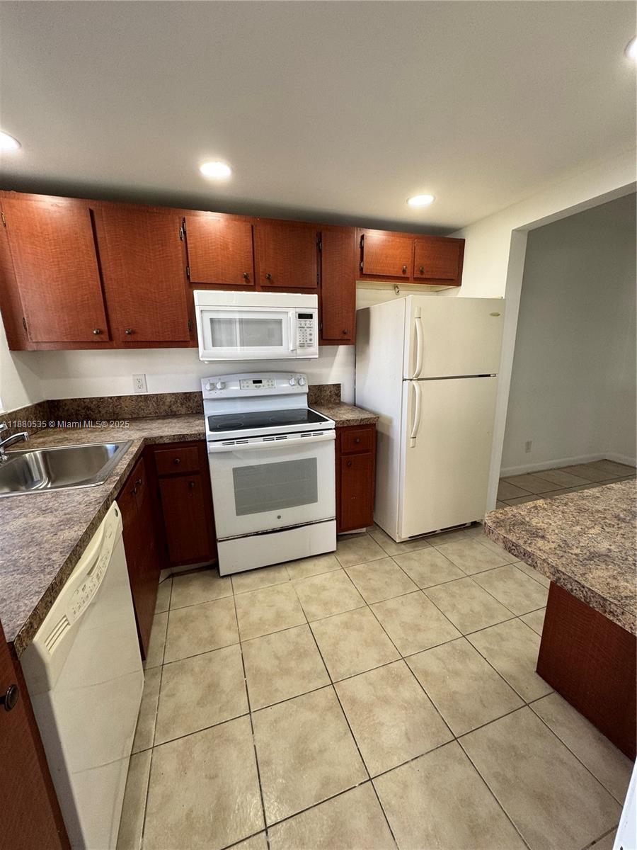 Discover modern comfort in this beautifully updated 1-bedroom, 1-bathroom condo at 1701 NW 46th Ave, Unit 105, Lauderhill, FL. With 590 sqf this move-in-ready gem features fresh paint, stylish new lighting fixtures, and a bright kitchen and dining-living room areas. The bedroom includes a walking closet.
This unit was just upgraded and is ready for a new tenant who is loking for a calm and clean space to call home
Located minutes from major highways, this condo offers both tranquility and accessibility.