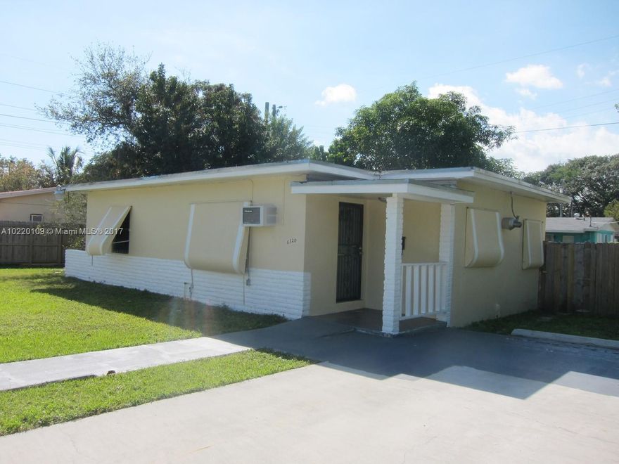 Students Welcome!  This 2 bedroom, 2 bath, 876 sf home on 6,888 sf lot is perfect for a small family or two students.  Welcoming front porch, tile floors throughout, new roof, interior laundry room with washer/dryer, large backyard with shed, fully fenced, mature mango tree, dog friendly.  Ready for immediate occupancy.  Central location and convenient to downtown South Miami, University of Miami and South Miami's medical corridor.  David Fairchild School District. Easy to show.