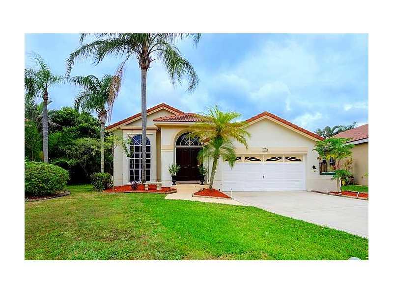 IMPECCABLY MAINTAINED 3 BEDROOM, 2 BATH HOME IN WONDERFUL COOPER CITY COMMUNITY. HOME FEATURES SPACIOUS FAMILY & DINING ROOMS, KITCHEN THAT OPENS TO FAMILY ROOM, SPLIT FLOOR PLAN, CERAMIC TILES IN LIVING AREAS AND NEWER CARPET IN BEDROOMS. PERFECT HOME FO R ENTERTAINING WITH 40 FT. SCREENED AND TILED PATIO ON OVERSIZE YARD BEAUTIFULLY LANDSCAPED WITH FRUIT TREES AND PLENTY OF ROOM FOR A POOL.