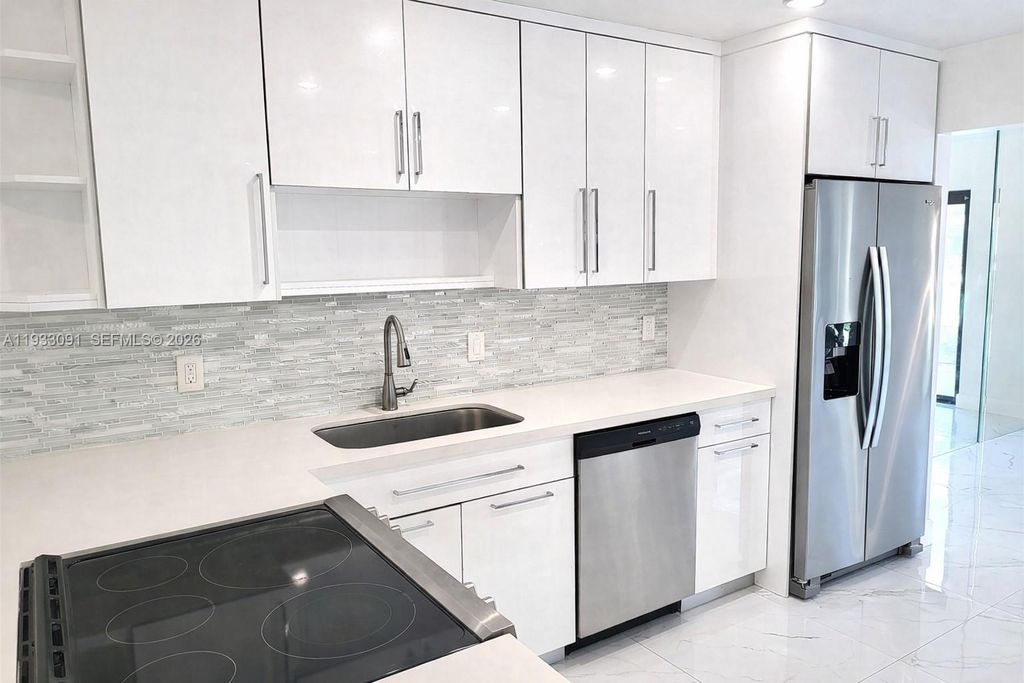 Photo of 9723 N New River Canal Road #416, Plantation, FL 33324 (MLS # A11933091)