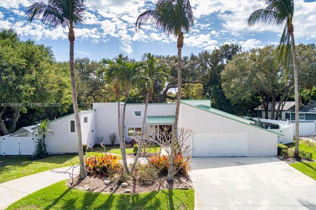 Photo of 3 Gumbo Limbo Way, Sewalls Point, FL 34996 (MLS # A11958691)