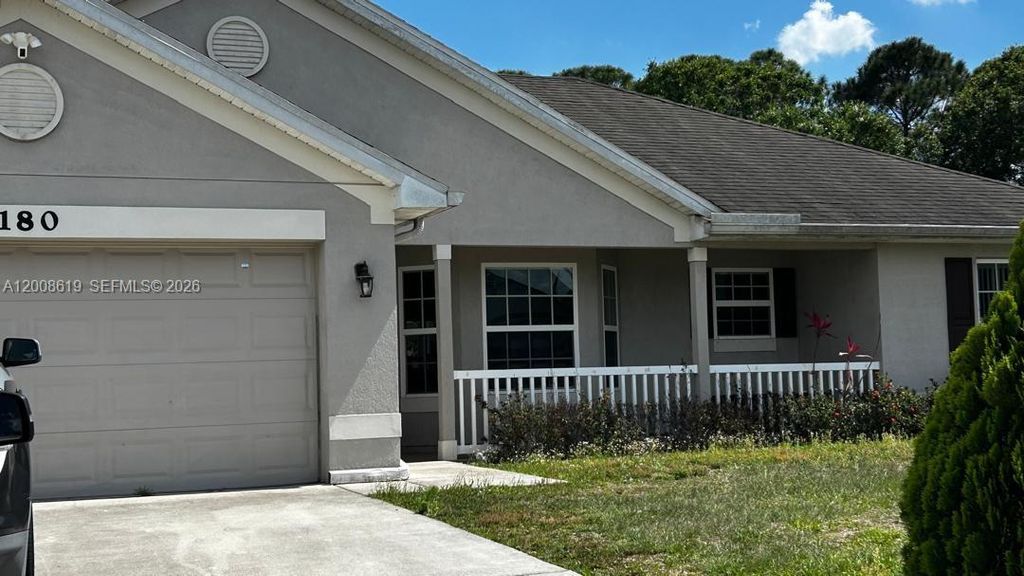 Photo of 180 SW Voltair Ter, Port St Lucie, FL 34984 (MLS # A12008619)