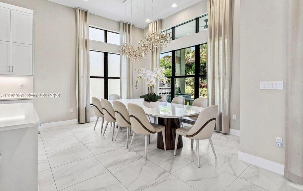 Photo of 8533 Ganton Dr, Boca Raton, FL 33434 (MLS # A11982653)