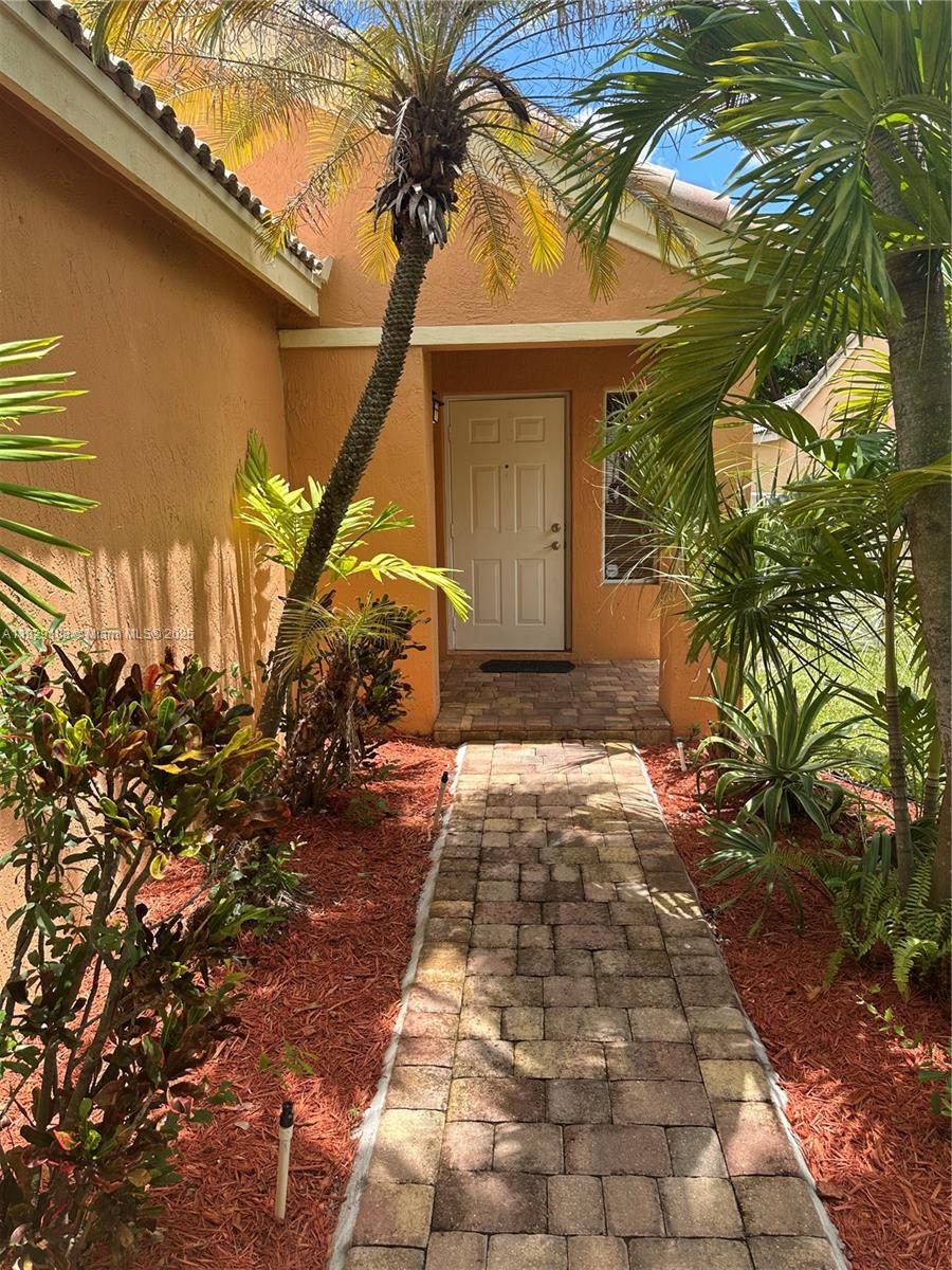 Welcome to this beautifully maintained 3-bedroom, 2-bathroom home located in the heart of the Ridges community in Weston. This charming one-story residence offers the perfect blend of comfort, functionality, and style. Enjoy a bright and inviting living space ideal for both everyday living and entertaining. All bedrooms feature ceiling fans, and the home is filled with abundant natural light. The fully fenced backyard provides added privacy, perfect for relaxing or outdoor gatherings. Additional features include: Washer & Dryer in unit, Two-car garage, No HOA application required. The Ridges is a centrally located gated community with A-rated schools just minutes away and quick access to major highways. Easy to SHOW!