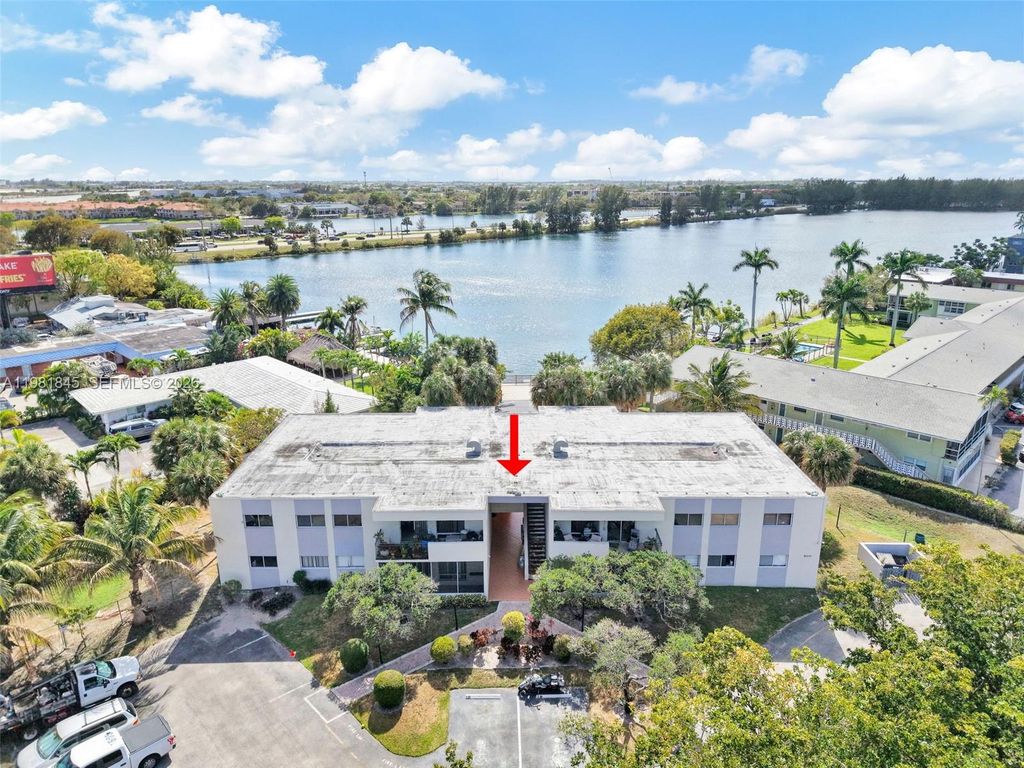 Photo of 900 Crystal Lake Dr #2B, Deerfield Beach, FL 33064 (MLS # A11981845)