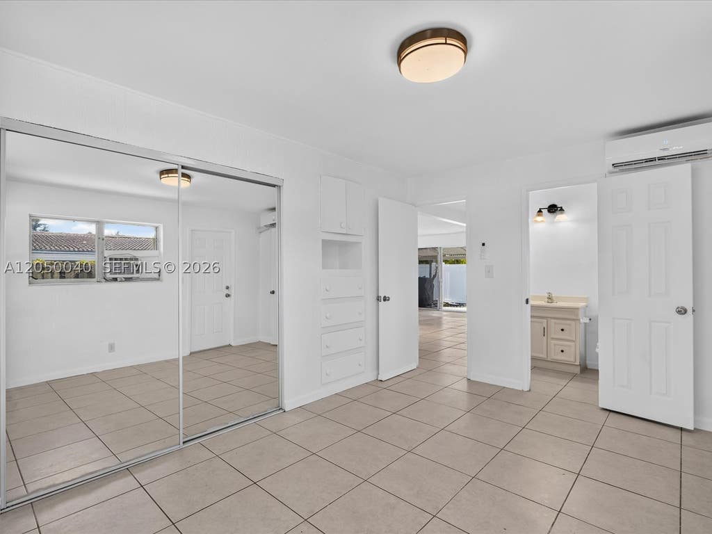 Photo of 2513 NE 33rd Ave #1-2, Fort Lauderdale, FL 33305 (MLS # A12050040)
