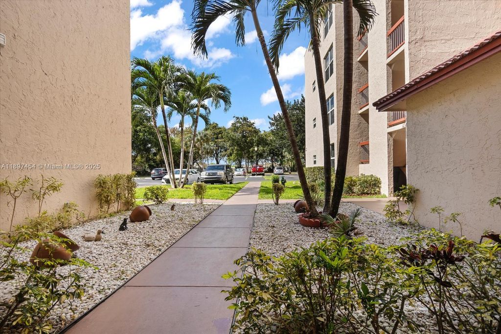 Photo of 9451 Evergreen Pl #303, Davie, FL 33324 (MLS # A11897454)