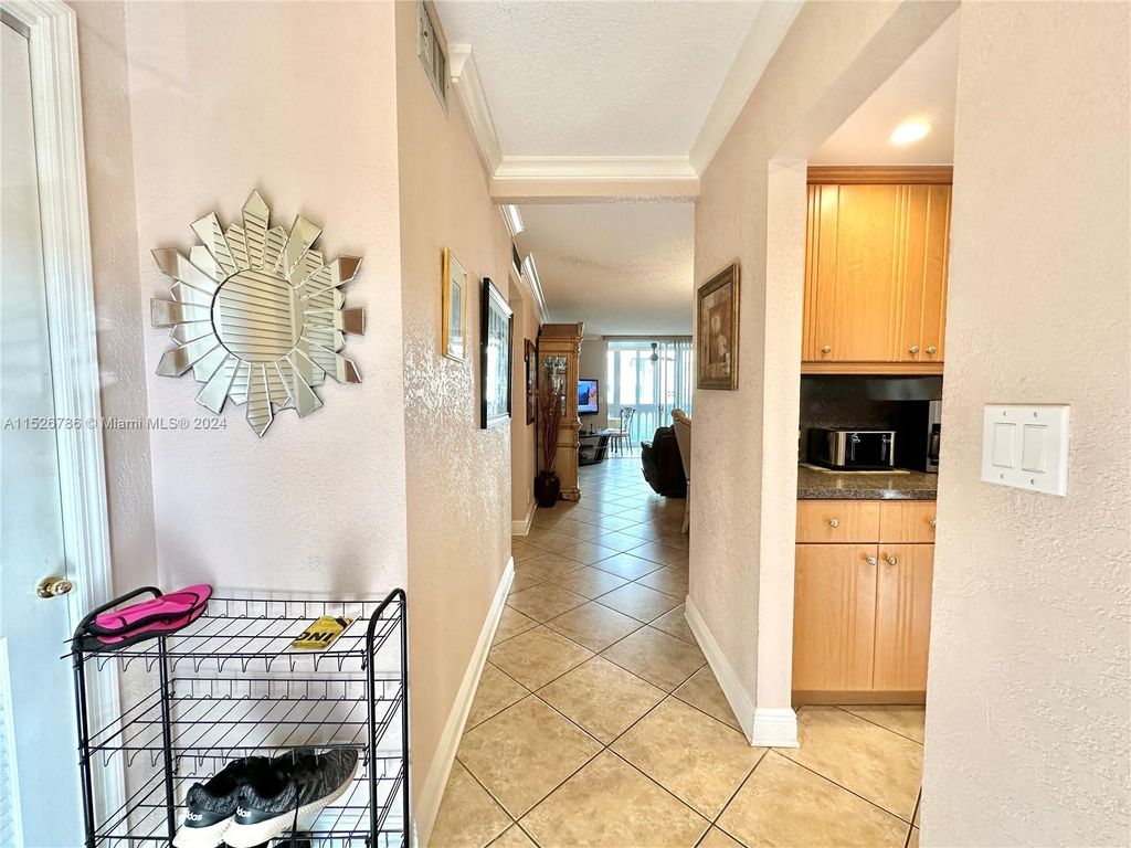 Photo of 301 NE 14th Ave #201, Hallandale Beach, FL 33009 (MLS # A11526786)