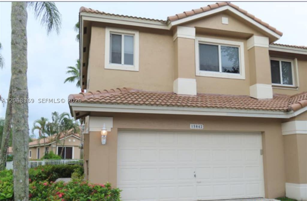 Photo of 15842 SW 10th St, Pembroke Pines, FL 33027 (MLS # A12068369)