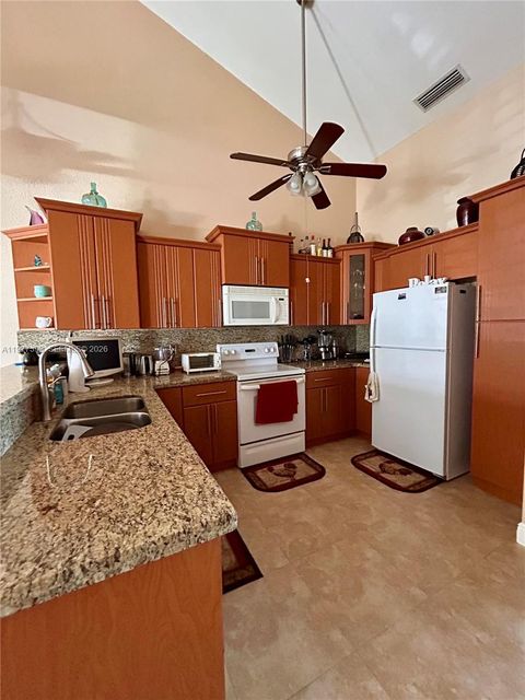 Tiny photo for 7171 Tam OShanter Blvd, North Lauderdale, FL 33068 (MLS # A11977398)