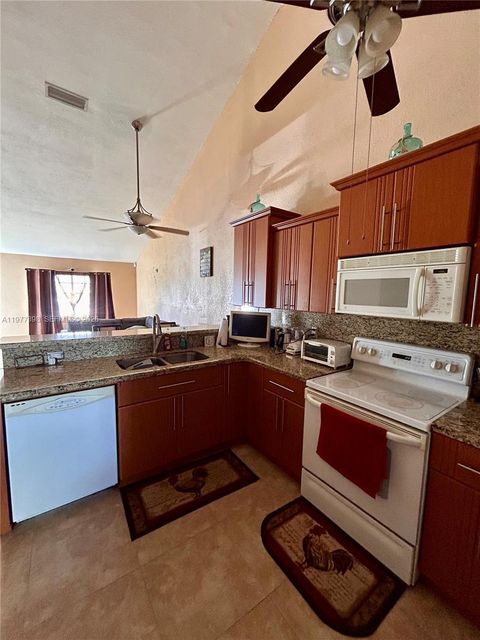 Tiny photo for 7171 Tam OShanter Blvd, North Lauderdale, FL 33068 (MLS # A11977398)