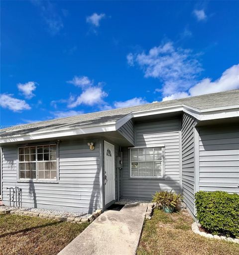 Photo of 7171 Tam OShanter Blvd, North Lauderdale, FL 33068 (MLS # A11977398)
