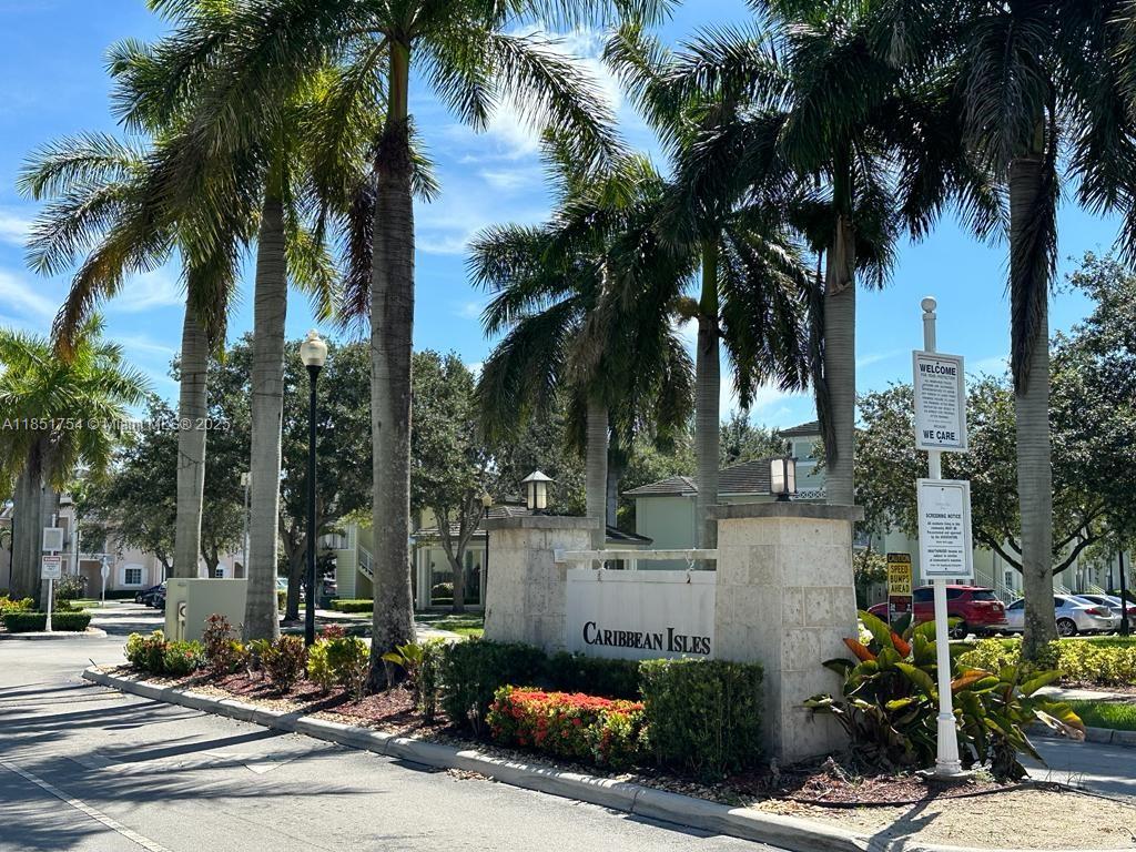 Magnificent 3 Bed/ 2 Baths At CARIBBEAN ISLES VILLAS, vinyl and ceramic floor, Washer and dryer in the unit, New Refrigerator, Dishwasher, Stove, Microwave, 24 hour maned gated community, Pool.