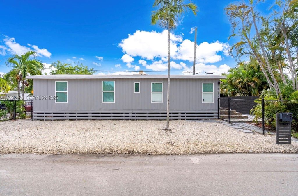 Photo of 2394 NE 136th Ter, North Miami Beach, FL 33181 (MLS # A11933426)