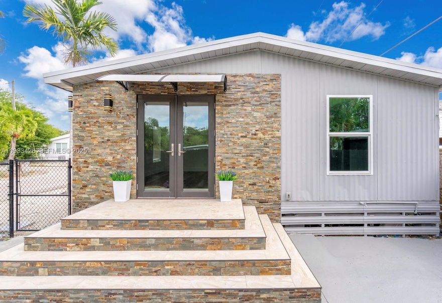 Beautiful double wide on a huge corner lot with no HOA you own the land. Right off of Biscayne Boulevard next to everything you could want. Must see!