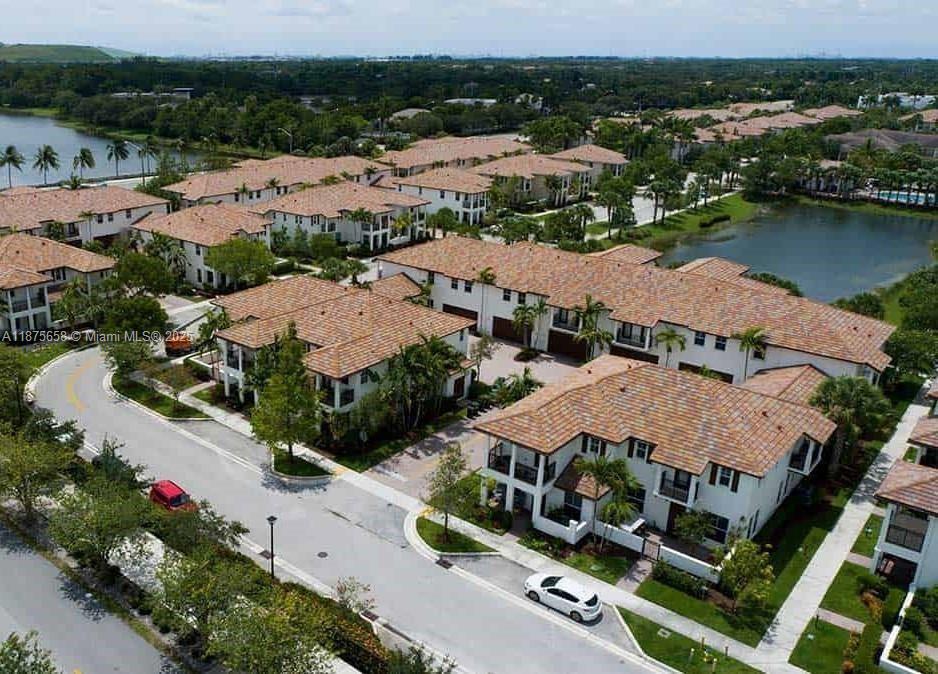 Beautiful corner townhouse in the desirable gated community of Paloma Lakes. Offers 3 bedrooms & 2.5 baths. Built in 2013. Adjusted area 1,861 sf, total sqfts 2,484. In neutral tones, spacious open floor plan. Kitchen features granite countertops, stone backsplash, stainless steel appliances, a bar-top island that opens to a bright living/dining area with a stone accent wall. Upstairs, all bedrooms have volume ceilings, ceiling fans, private balconies, conveniently utility room with washer and dryer. The spacious master bedroom includes his-and-her walk-in closets and a bathroom with double sinks, soaking tub, and separate shower. Additionally, tinted windows.2 Car garage, steps from the Promenade’s shopping easy access to major highways, good schools. Pets allowed (non-aggressive breeds)
