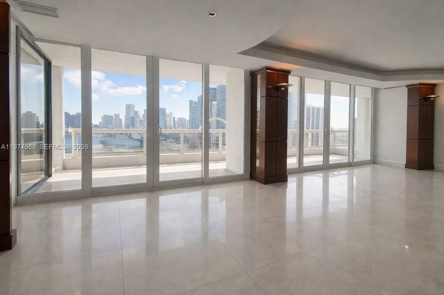 The kitchen has been beautifully renovated, with the former curved wood wall removed to create a more open layout, maximizing the 1,500 sq. ft. floor plan and enhancing the surrounding views.