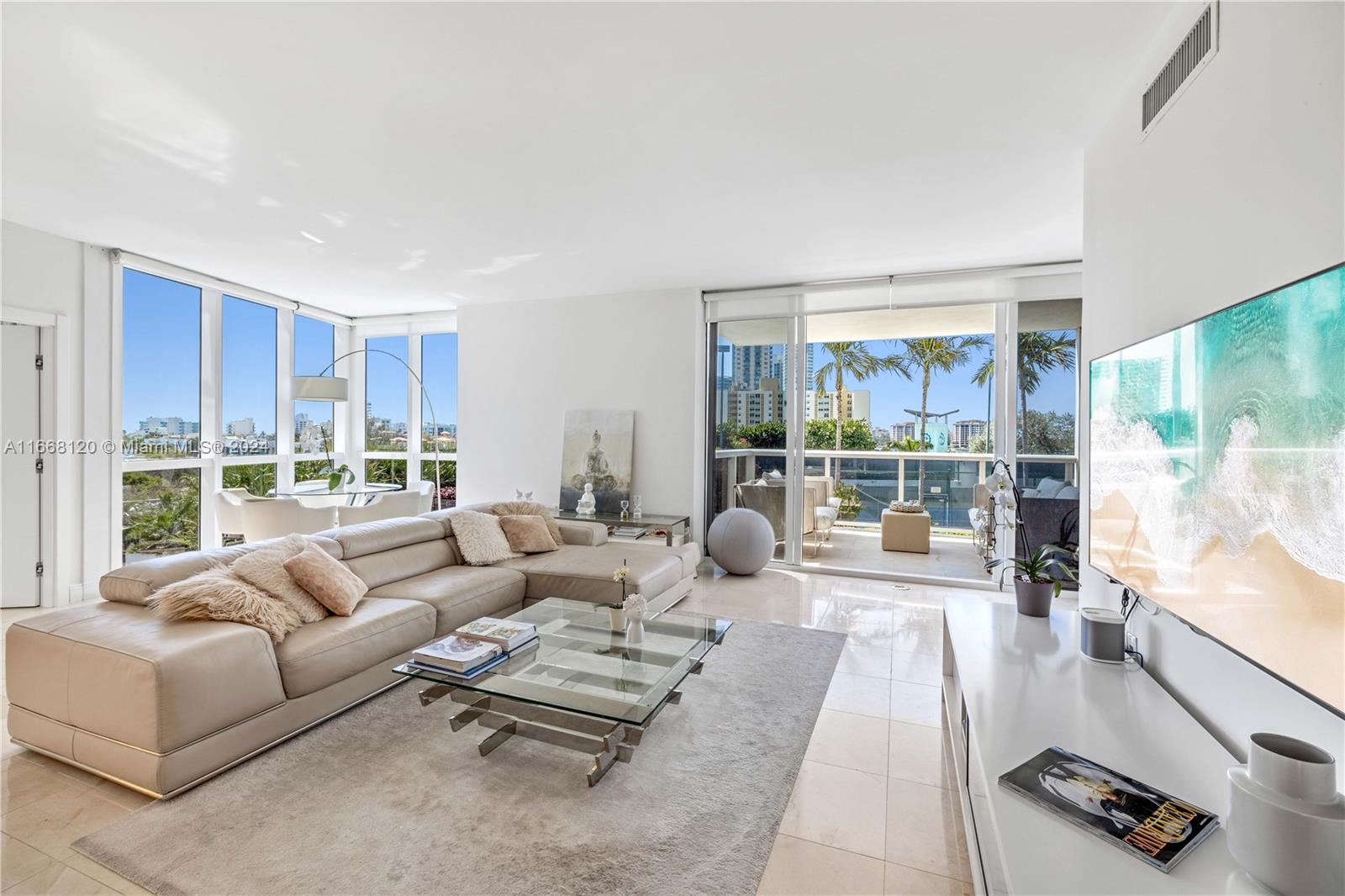 Take a closer look! Beautifully remodeled corner residence boasts an abundance of natural light, thanks to floor to ceiling windows. The apartment features a new kitchen, sleek bathrooms and elegant marble flooring throughout. The spacious and deep balcony offers a serene outdoor space. Enjoy top tier amenities and unbeatable location, this unit offers a perfect balance of luxury, comfort, and convenience.