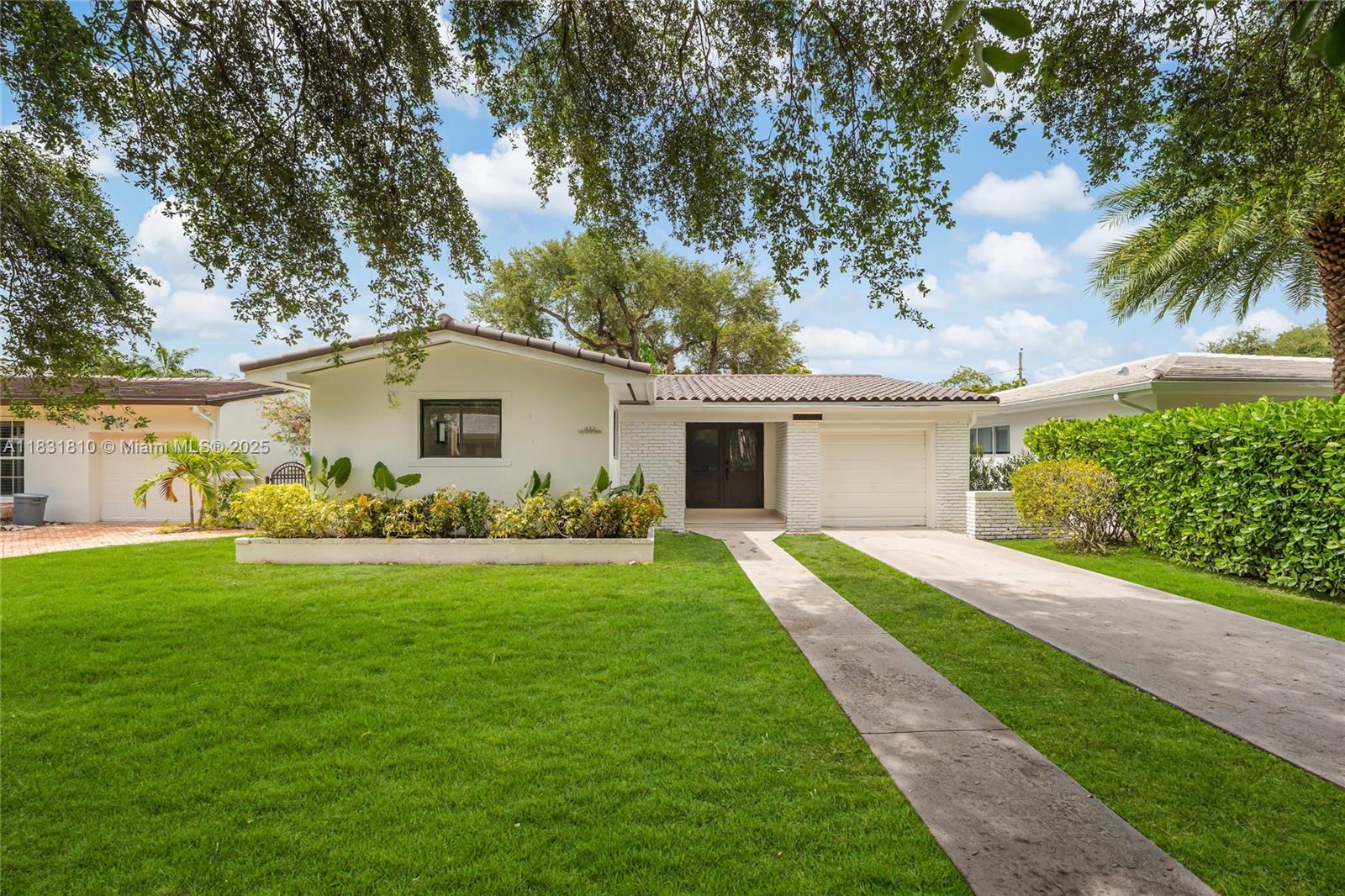 Charming Coral Gables Home with Approved Pool Plans! This beautifully renovated 3-bed, 2-bath residence offers a bright & spacious layout with brand-new waterproof wood flooring, elegant formal living & dining rooms, a large separate family room, & an open-concept kitchen ideal for entertaining while enjoying serene backyard views. 2025 upgrades include a new tile roof, new A/C, impact windows & doors, PVC re-lined plumbing, modern state-of-the-art bathrooms, & a 1-car garage. The fenced & landscaped backyard features a patio with plenty of room for a pool — with approved plans already in place. Perfectly located just steps from Miracle Mile, Youth Center, Publix, & top Coral Gables dining. Only 10 minutes from Miami International Airport & a short drive to Downtown, Brickell, & the beach.